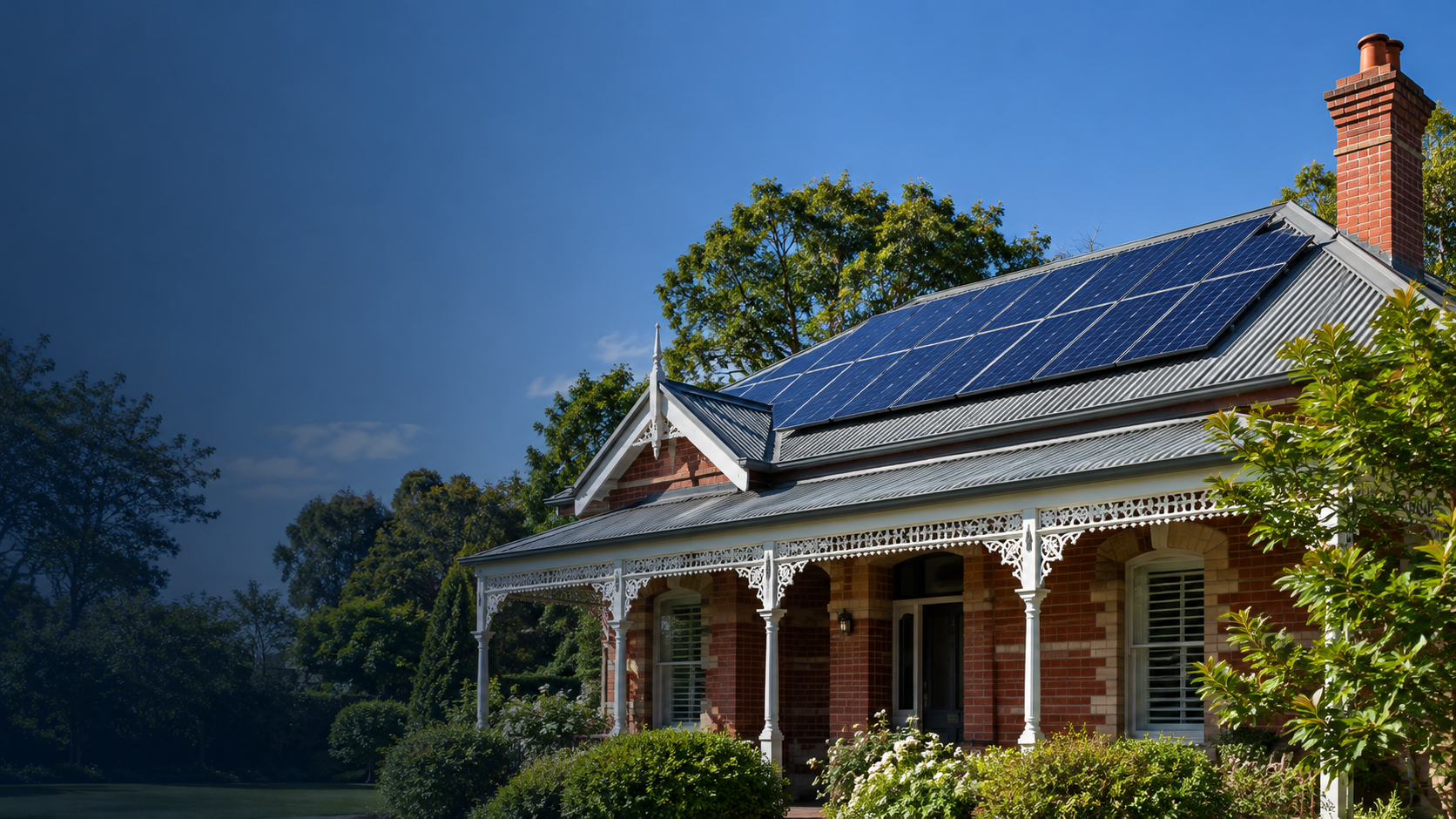Red-brick Victorian home with solar panels on the roof